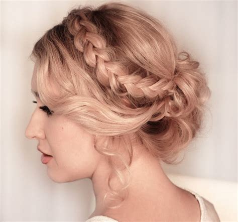 Pull hair from the back of neck and start braiding two french braids each towards the ears crossing it over the head resembling a headband. Romantic Braided Updo for Prom | Styles Weekly