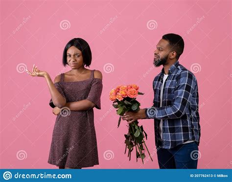unwanted confession displeased black woman rejecting her admirer with roses on valentine s day