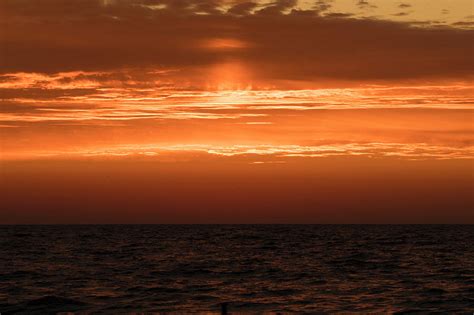 Fiery Sunrise Over Lake Michigan Photograph By Kathy Gallow