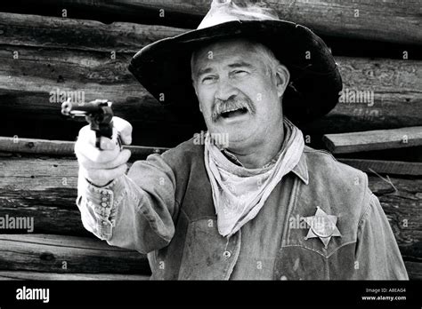 Sheriff Cowboy Reenactor Gun Pointed Hi Res Stock Photography And