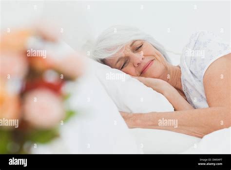 Mature Woman Sleeping Stock Photo Alamy