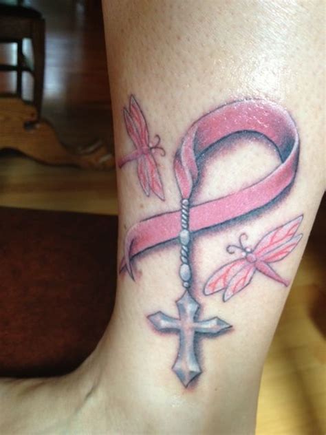 Emma chose to combine a yellow ribbon to represent her bone cancer diagnosis with a pink ribbon to represent her mother, who is a breast cancer survivor. not sure about the dragonflies... and i think i'd like the ...