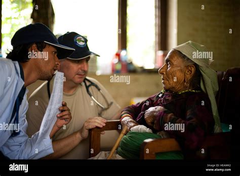 A Nepali Doctor And Lt Col Michael Wood 15th Medical Group Joint