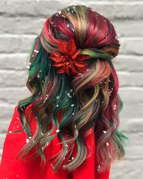 Use clear elastics to create a bubble effect and then cinch each with a stylish barrette like these. Christmas is in the air — and in the hair. Jasmine of Rock Your Locks salon created a holiday ...