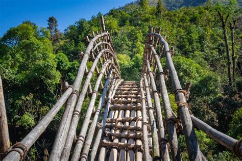Traditional Bamboo Bridge For Crossing River At Forest At Morning From