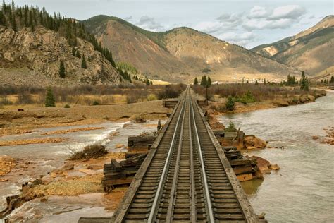 Free Images Landscape Mountain Track Train River Valley Vehicle