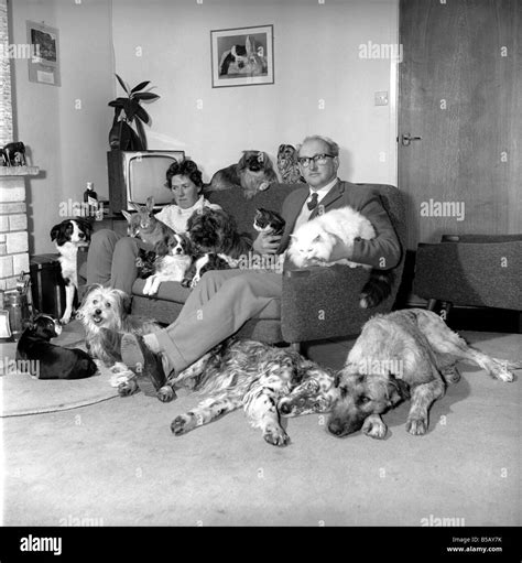 John Holmes Seen Here With His Wife And Surrounded By All His Pets
