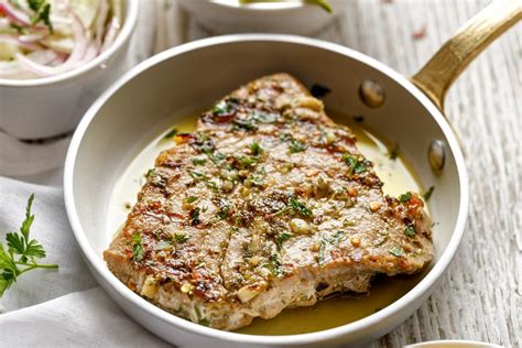 How to cook tuna steaks 3 ways. How to Cook Tuna Steaks in a Pan | LEAFtv