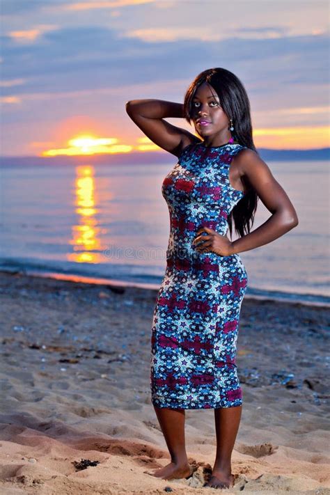 Beautiful Black African American Woman Posing On The Beach At Su Stock