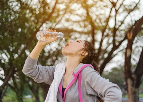 Young Sporty Woman Drinking Water In Park Stock Image Image Of