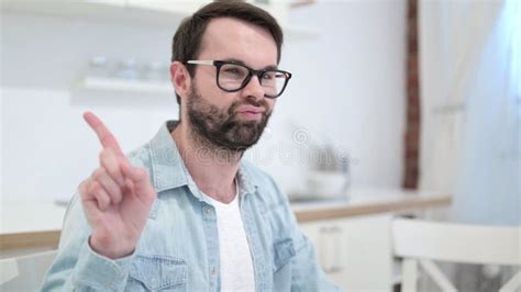 Serious Beard Young Man Saying No With Finger Gesture Stock Image