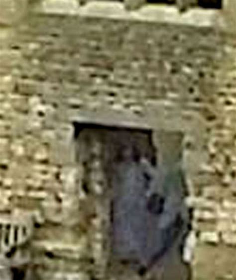 a chilling figure of a ghostly woman in grey has been caught on camera on a day trip to dudley