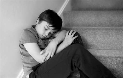Black And White Portrait Sad Boy Sitting Alone On Staircase Lonely Kid