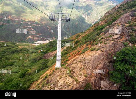 Aerial Tram Passing Through The Rugged Landscape Of Chicamocha Canyon