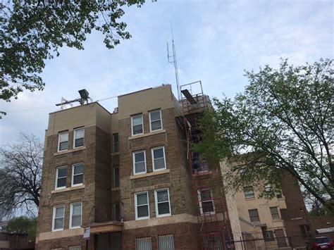 Repair And Rebuilding Of A Brick Parapet Wall In Chicago By Edmar