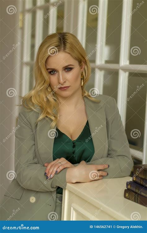 Blonde Girl In A Gray Suit And A Green Blouse Close Up Stock Image Image Of Blouse Costume