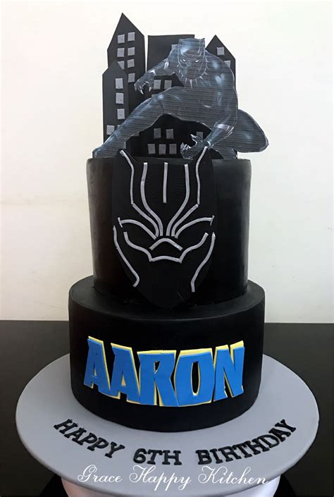 The cake was fluffy vanilla with fresh strawberry marvel cake. Black Panther Cake | Panthers cake, Black panther, Avenger ...