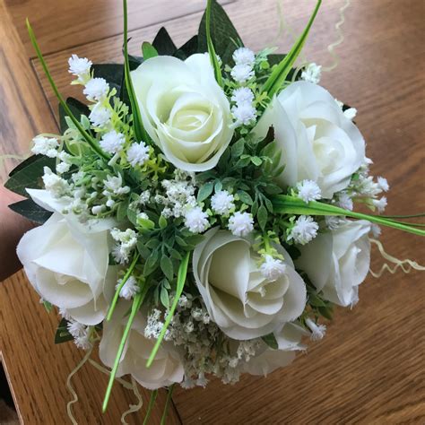 A Collection Of Wedding Bouquet Ivory Roses Gyp Abigailrose