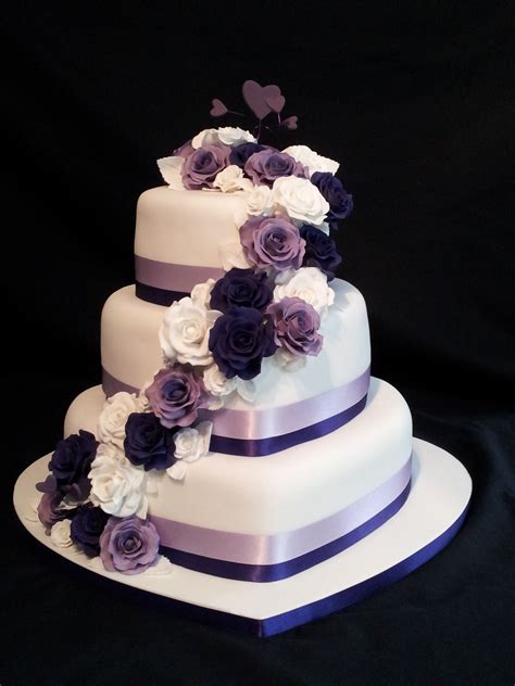 3 Tier Heart Shaped Wedding Cake Roses Cascading Down With A Purple Theme Heart Shaped Wedding