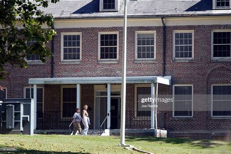 Women Walk On The Grounds Near A Building At The Alderson Federal