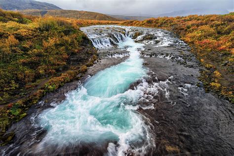 Waterfall And Flowing Water In A River Bruarfoss Iceland Stock