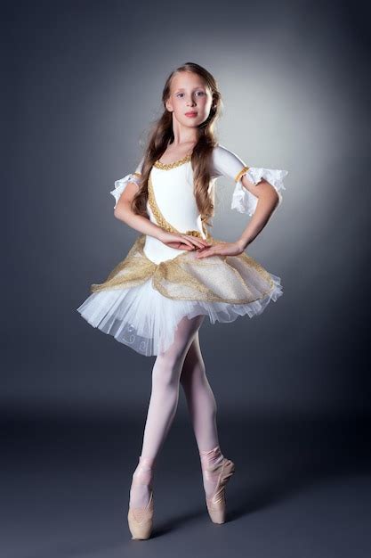 Premium Photo Graceful Longhaired Ballerina Posing At Camera