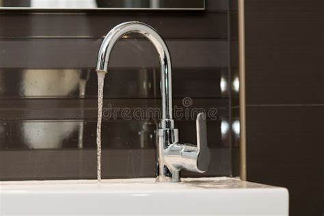 Luxury Design Water Tap With Flowing Water Bathroom Equipment Stock