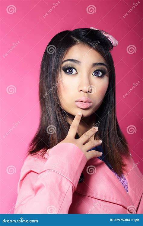 Attractiveness Portrait Of Asian Brunette With Big Surprised Eyes