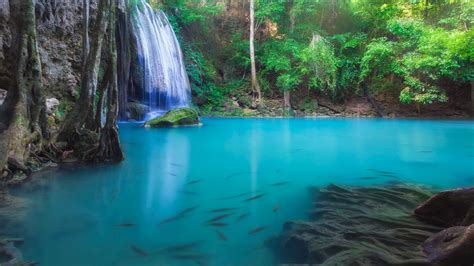 erawan-waterfall-in-deep-forest-over-pond-with-fishes,-kanchanaburi