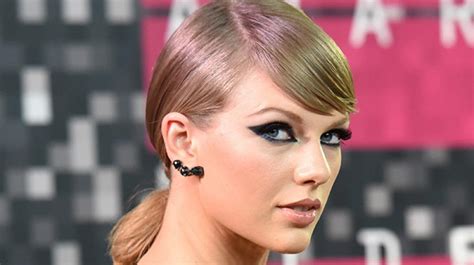 Taylor Swift Fights Her Nearly Naked Robot Clone In Futuristic Music
