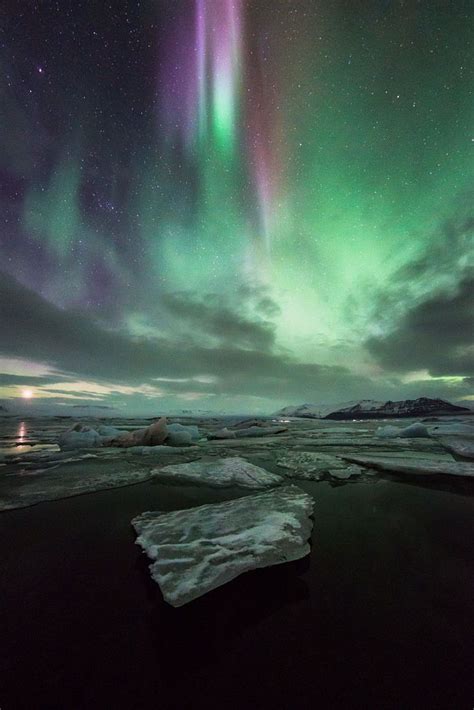 Northern Light Storm Displays In The Sky Around Jokulsarlon Iceland