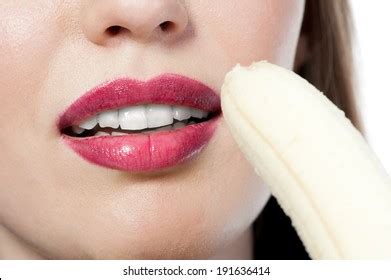 Beautiful Sexy Girl Eating Banana On Shutterstock