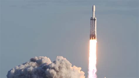 Spacexs Falcon Heavy Rocket Launches First Paid Mission And Lands All