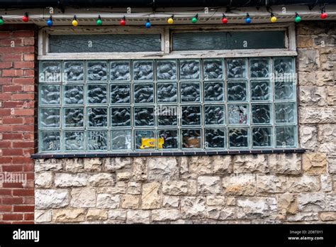 Large Glass Bricks Window In A 60s Clubs Wall Stock Photo Alamy