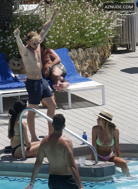 zara mcdermott shows off her sensational bikini body as she chills in a hotel pool in marbella