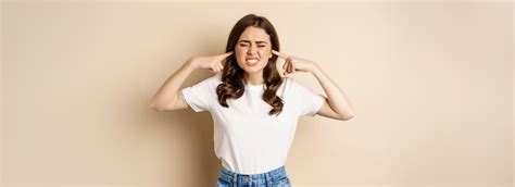 Free Photo Annoyed Young Woman Shut Ears From Loud Noise Feeling