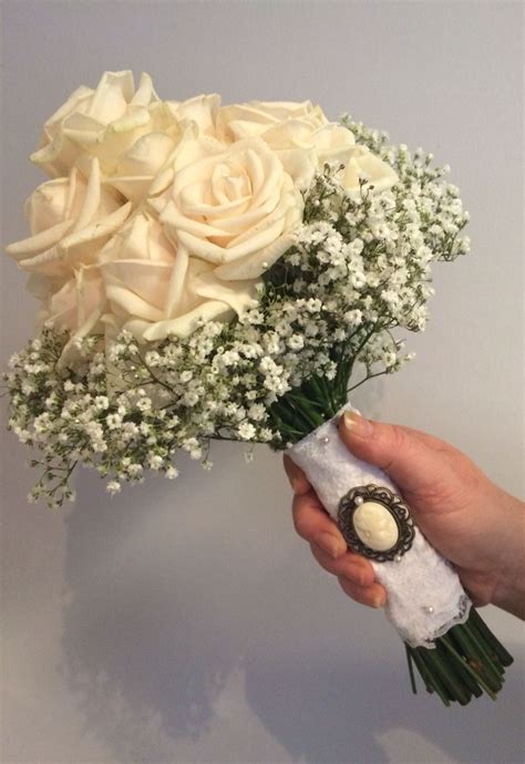 Ivory Rose And Gypsophila Bouquet With Lace And Brooch Detail