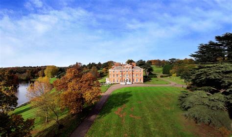 An Aerial View Of A Large Mansion In The Fall