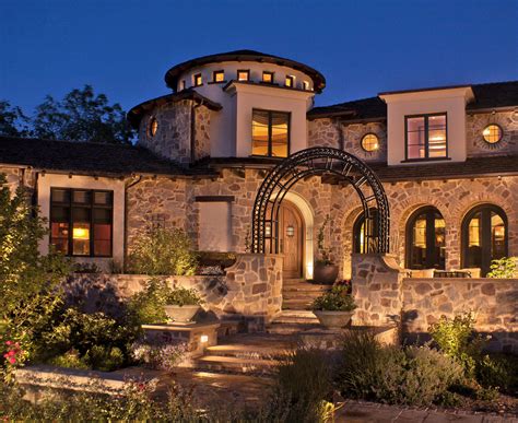 Home exterior colors should blend with the terrain and the landscape of your neighborhood. Deep River Partners | Tuscan Designed Residence