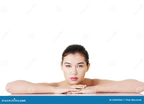 Naked Woman Lying On Hands On A Table Stock Photo Image Of Caucasian