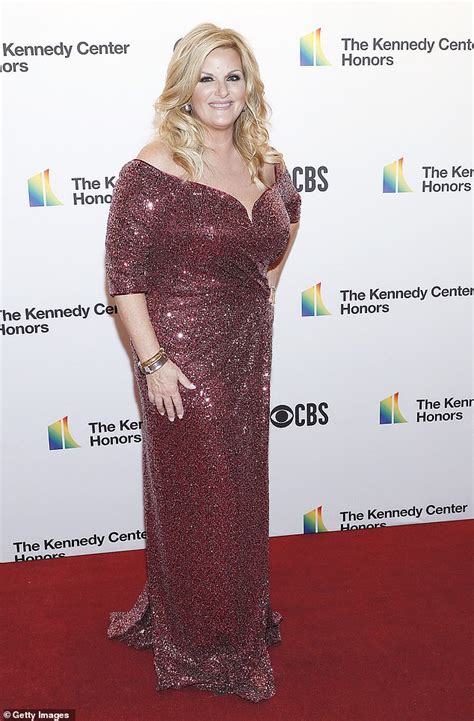 Trisha Yearwood Shines In Glittery Gown While Garth Brooks Dons Stetson