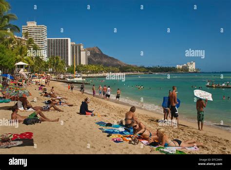 People On The Sand At Waikiki Beach Honolulu Oahu Hawaii Stock Photo