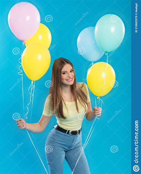 Portrait Of Beautiful Young Girl Holding Balloons Stock Image Image
