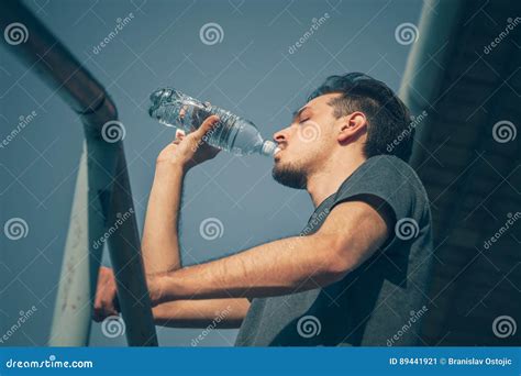 Young Man Drinking Water After Running Outdoor Stock Image Image Of