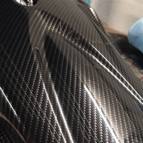 Motorbike Pieces Dipped In Black Carbon Fibre Over Grey All Polished Up