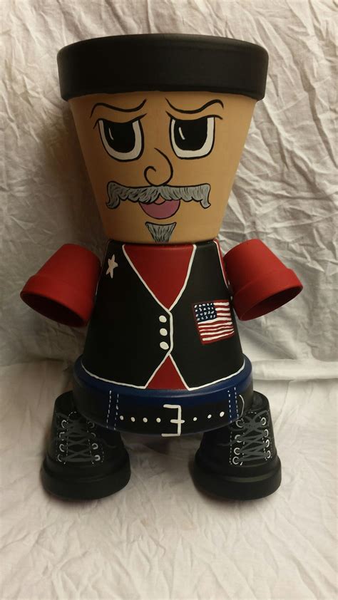 A Nutcracker With An American Flag On Its Chest And Black Shoes