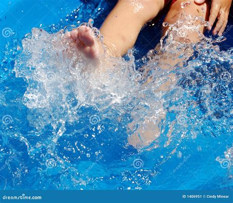 Child Kicking In Pool Stock Image Image Of Splash Water 1406951