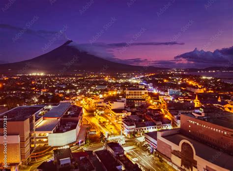 Mayon Volcano With Legazpi City Lights In Legaspi City Albay
