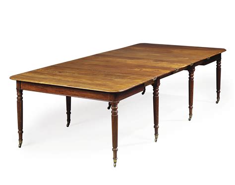 A Regency Mahogany Extending Dining Table In The Manner Of Gillows