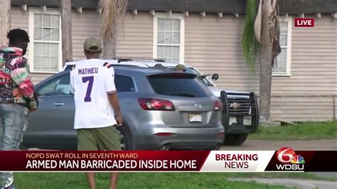 Armed Man Barricaded Inside Home